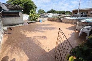CASA COM SALA COMERCIASL JD. ALVORADA